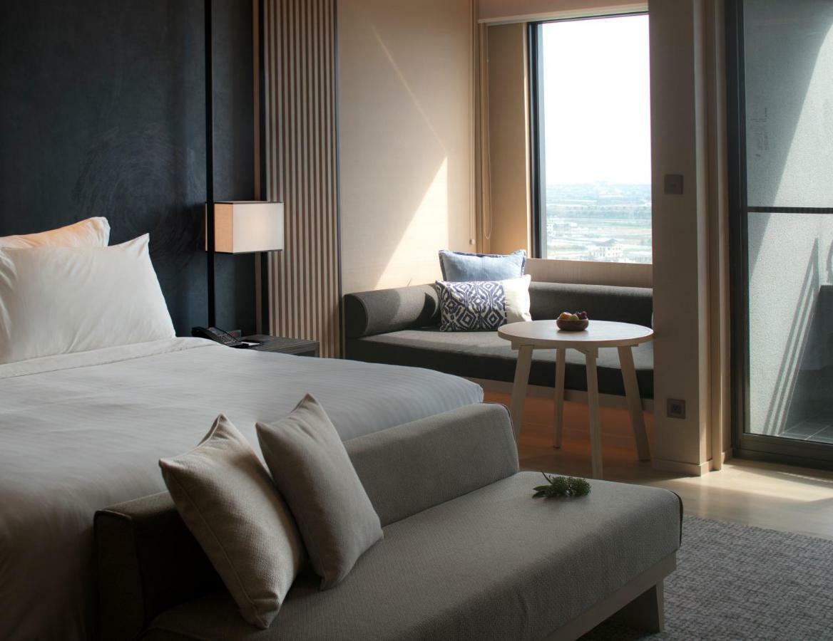 Mu Jiaoxi Hotel Εξωτερικό φωτογραφία A bedroom at the hotel